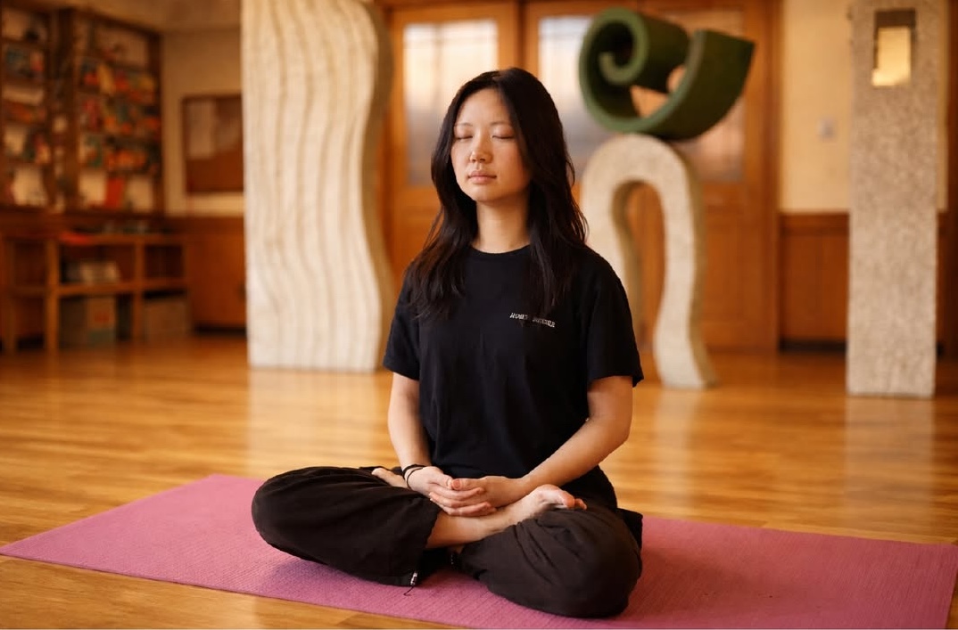 A student meditating at the Tainan yoga centre
