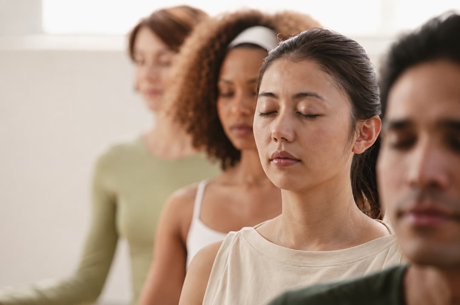 closeup-group-meditation A student meditating at the Tainan Yoga and Meditation Centre